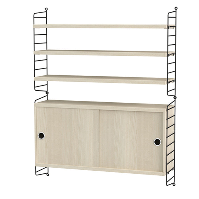 Deze kleinere woonkamercombinatie doet het geweldig als aanvulling in een grotere woonkamer essen-met-zwart-string-opstelling-I