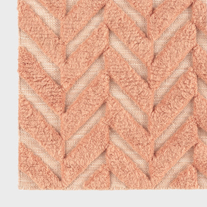 Dusty Deco Herringbone Rug Salmon Pink detailfoto high-low effect wol
