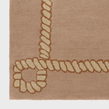 Dusty Deco Rodeo Rug Blush detailfoto geknoopte hoeken en touwrand
