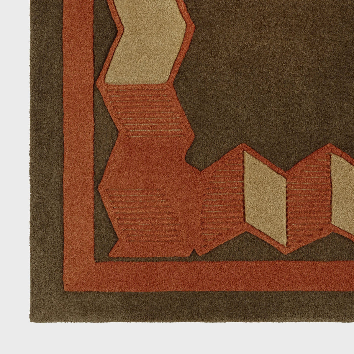 Dusty Deco Origami Rug Olive detailfoto wol en geometrisch patroon