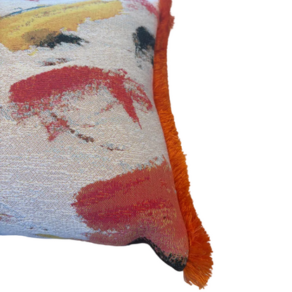 Pierre Frey kussen La Toile du Peintre met oranje franje